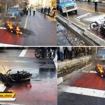 مرد جوانی در خیابان ولی عصر تهران در اعتراض به توقیف موتورش توسط پلیس، آنرا به آتش کشید